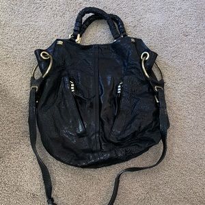 Beautiful black leather distressed handbag